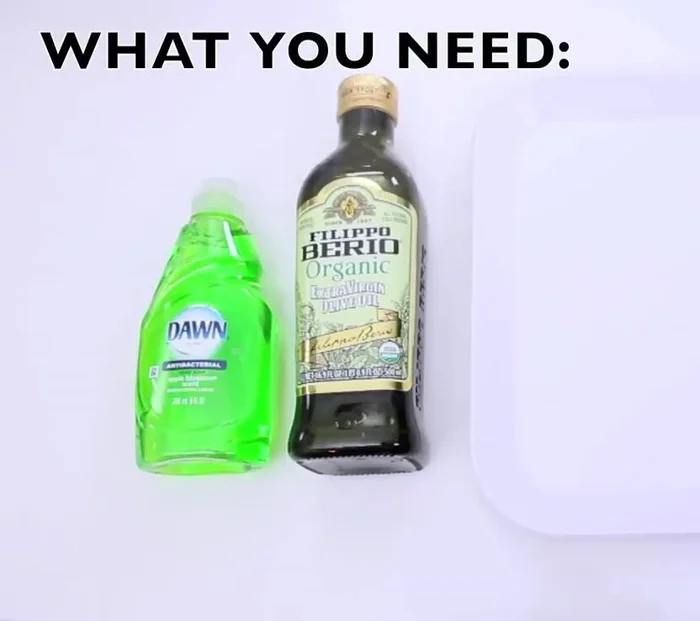 Mix antibacterial hand soap and extra virgin olive oil on a plate.