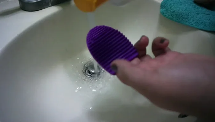 Swirl the brush on the sponge until it becomes frothy.
