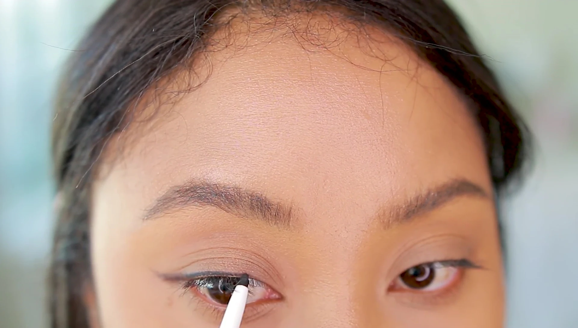 The final winged eyeliner look on one eye.