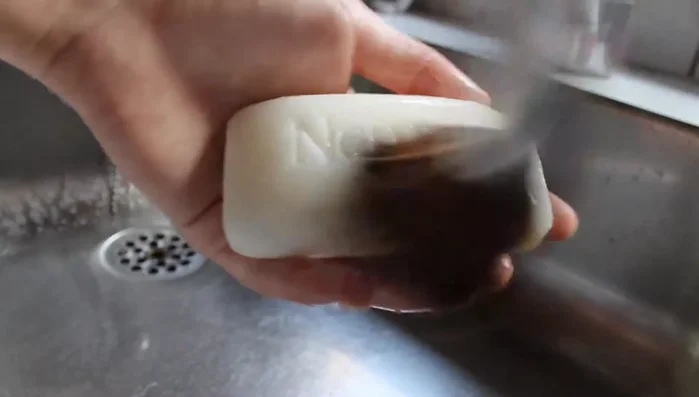 Swirl the brush on the soap.