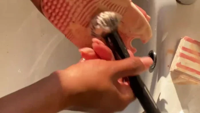 Run brushes under water.