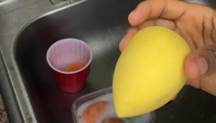 Rinse one last time and let the Beauty Blender air dry on a clean napkin or paper towel.