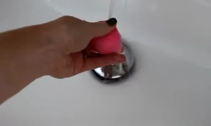 Applying foundation using Beauty Blender