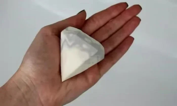 Applying foundation using Beauty Blender