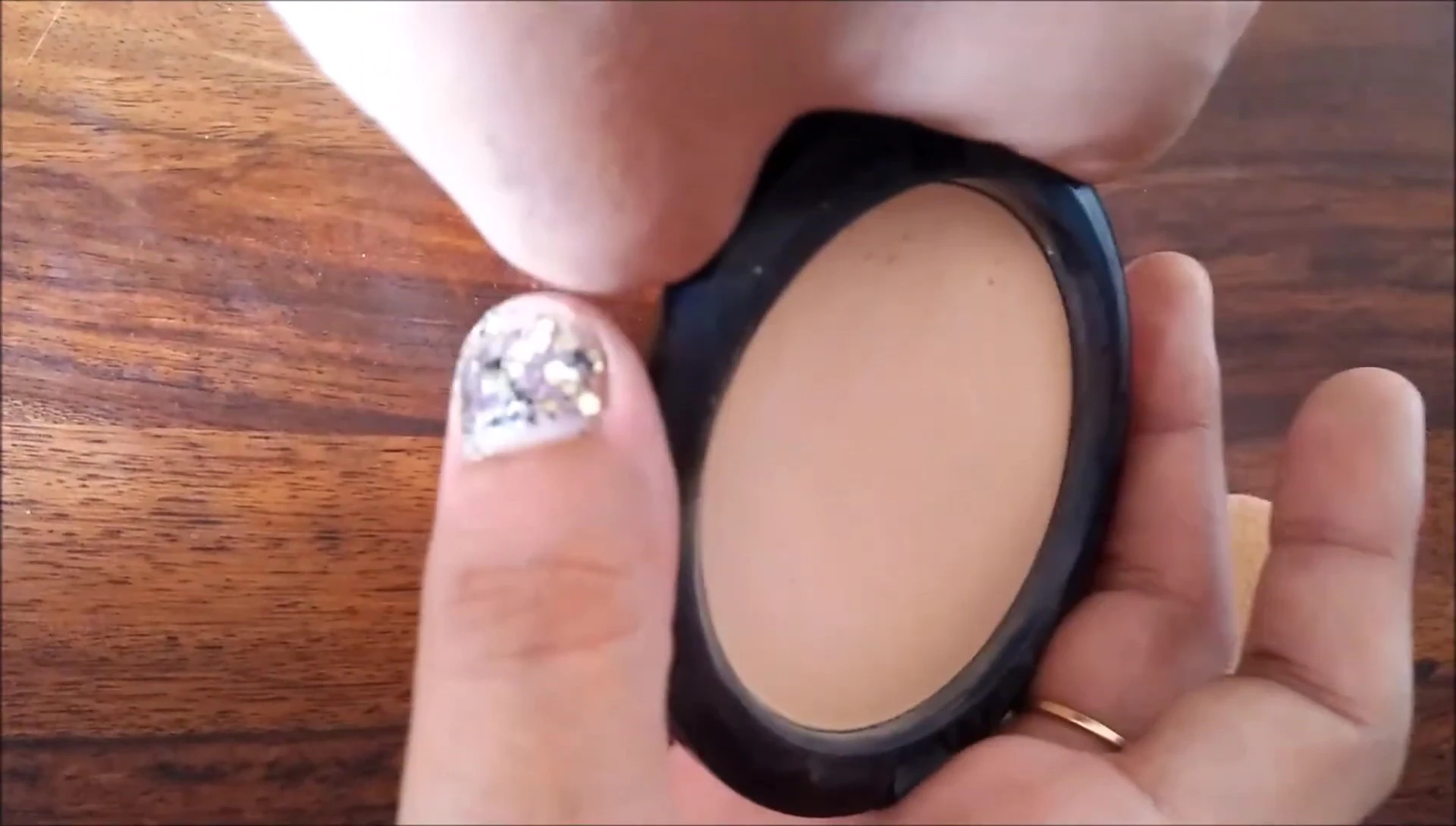 Swatches of the pressed powder on the arm
