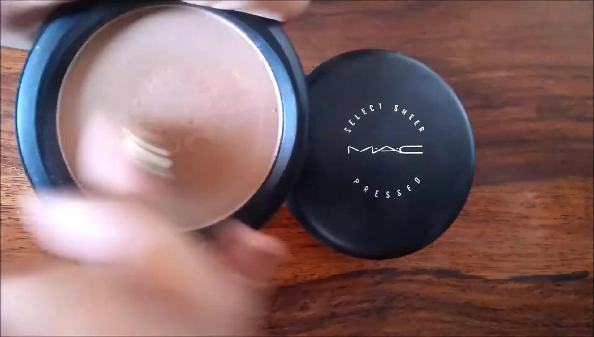 Swatches of the Mac Bronzing Powder on the arm