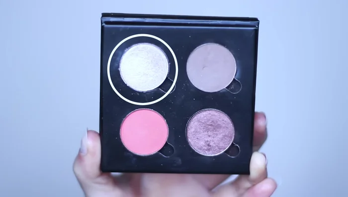 Apply fade shade to blend the highlight and contour, creating a seamless transition. Blend into the crease as well.