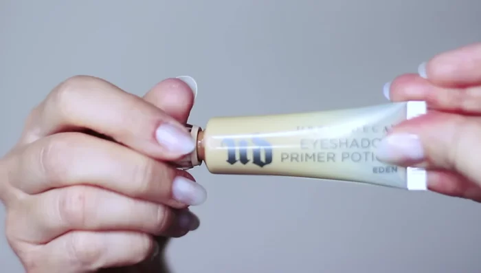 Apply primer to create a clean base. This helps eyeshadows last longer and disguises discoloration.