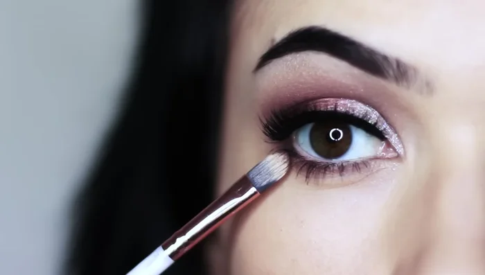 Apply mascara liberally to both upper and lower lashes.