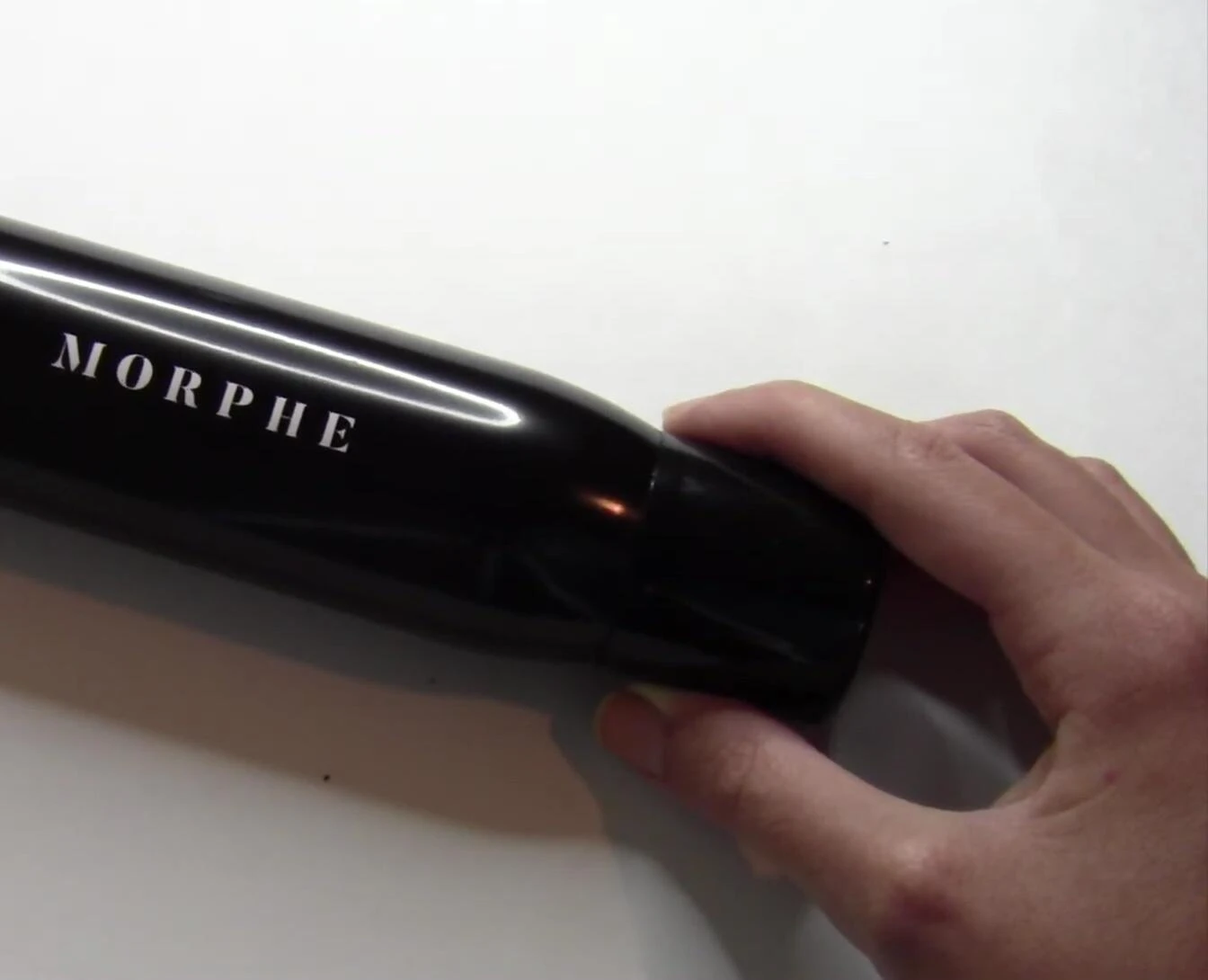 The reviewer showing the dewy look after application.