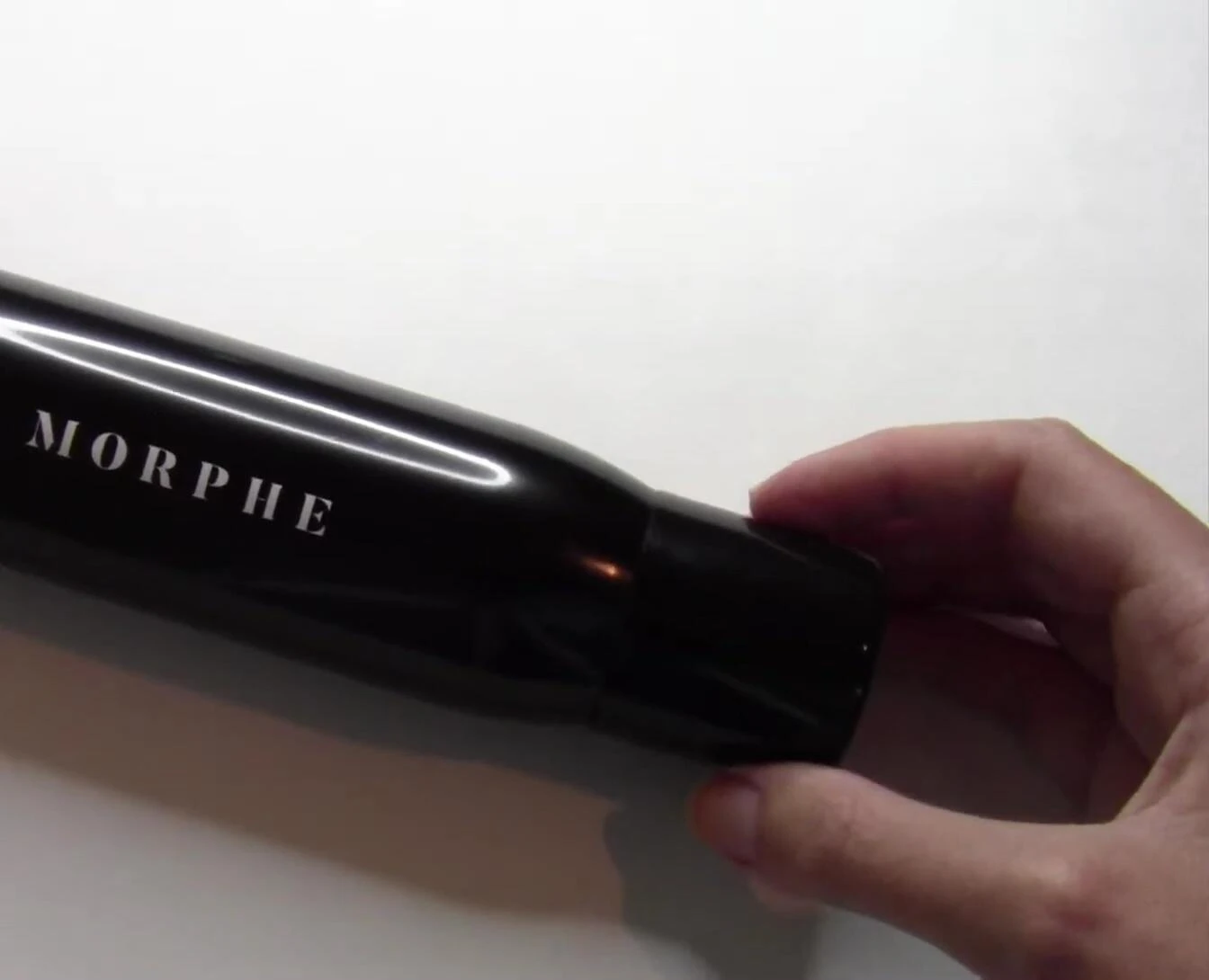 Close-up shot of the Morphe Continuous Setting Mist bottle.