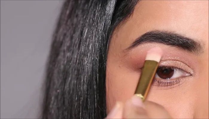 Highlight the brow bone.