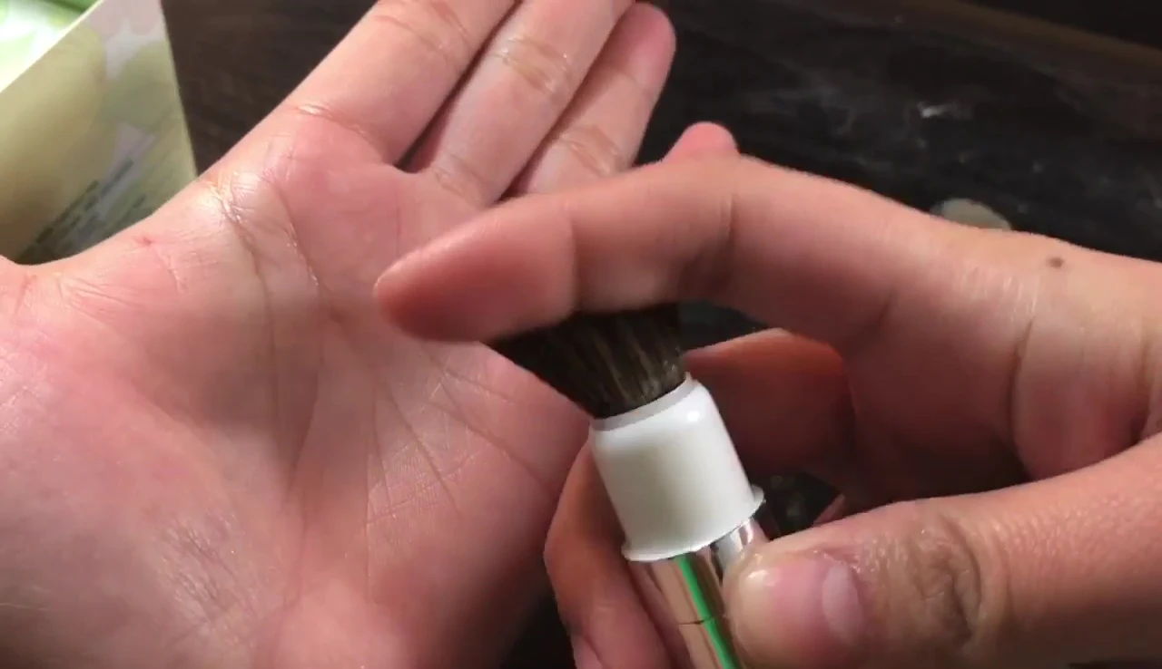 Close-up of the included brush, noting its material and feel.