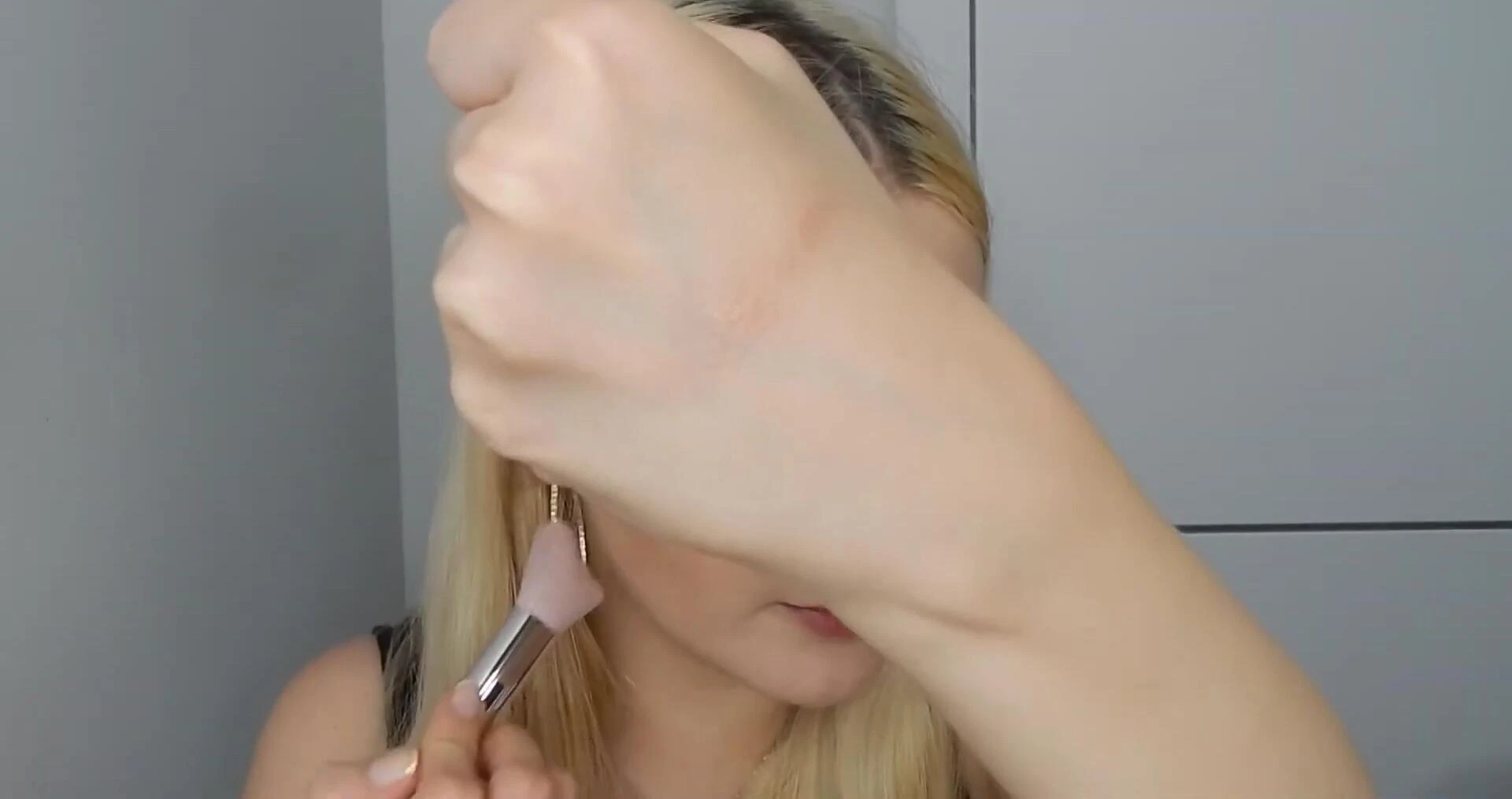 Swatches of the Fairy Bomb Shimmer Powder on the speaker's hand.