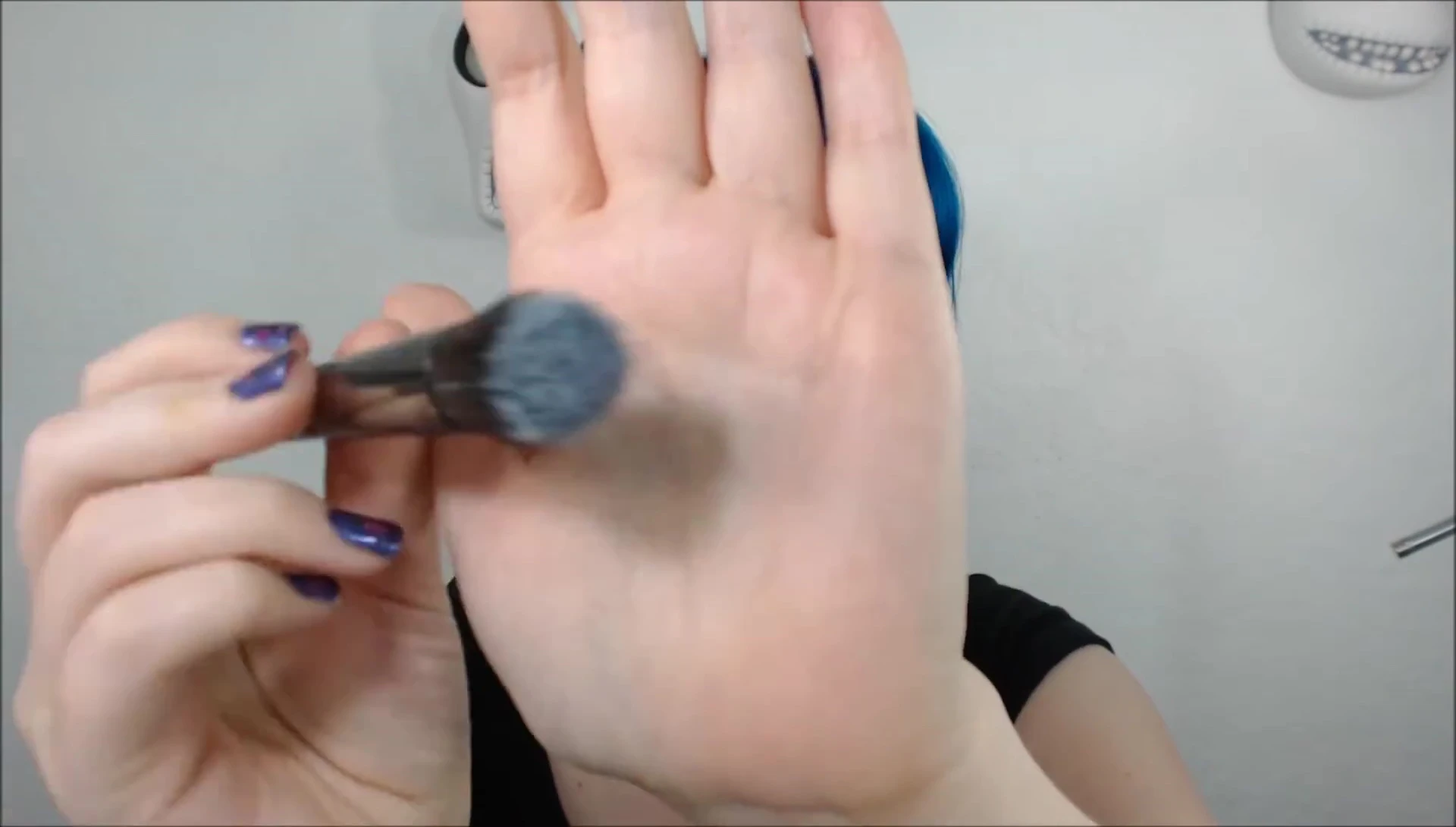 The Makeup Geek highlighter brush