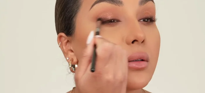 Finish by applying mascara and false lashes (optional).