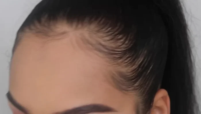 Blend purple and shimmery shades onto the cut crease.