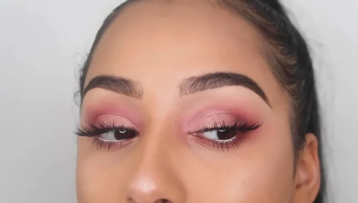 Apply mascara and any finishing touches.