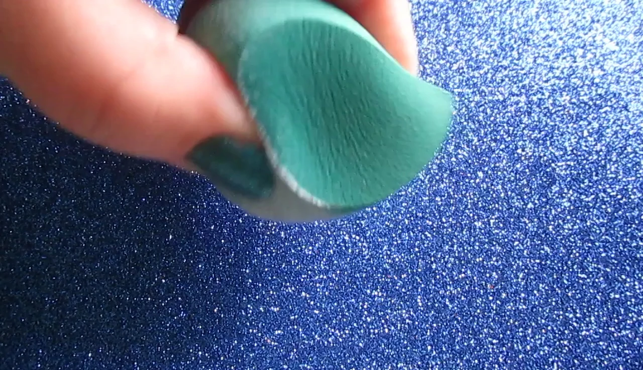 The sponge demonstrating its stiffness