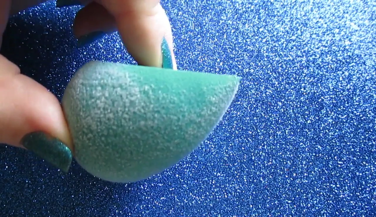 The sponge showing the flocking powder coming off