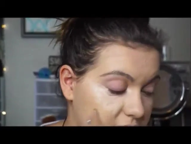 Speaker applying and blending concealer.