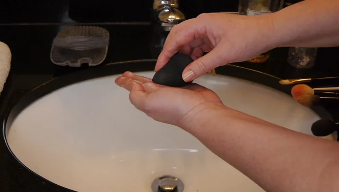 Clean the Beauty Blender: For Beauty Blenders, use the deep cleansing oil. Roll and rotate the sponge to evenly distribute the oil. Squeeze the oil through the sponge using your fingertips and palm to avoid tearing the fabric.
