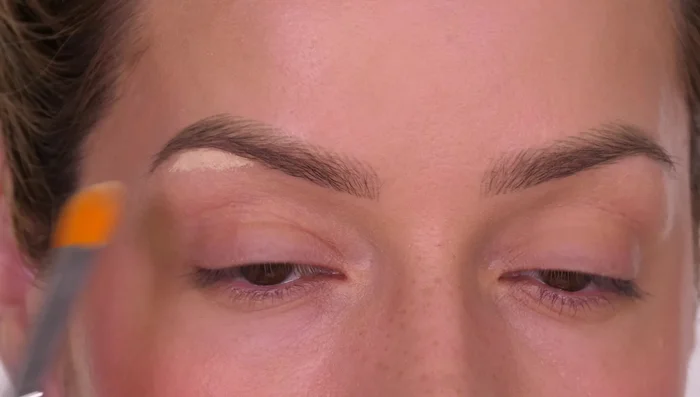 Apply concealer to the outer corner of your eye, following the lower lash line upwards towards your temple, to create fullness and a lifted appearance.