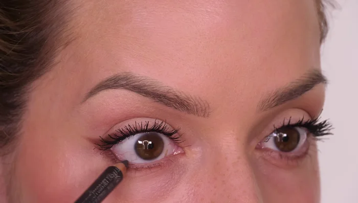 Apply a few individual lashes to the outer third of your lash line for extra lift and definition.